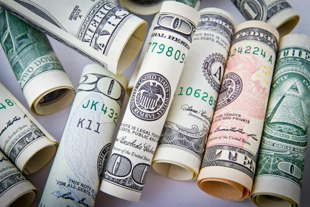 rolled up american dollars